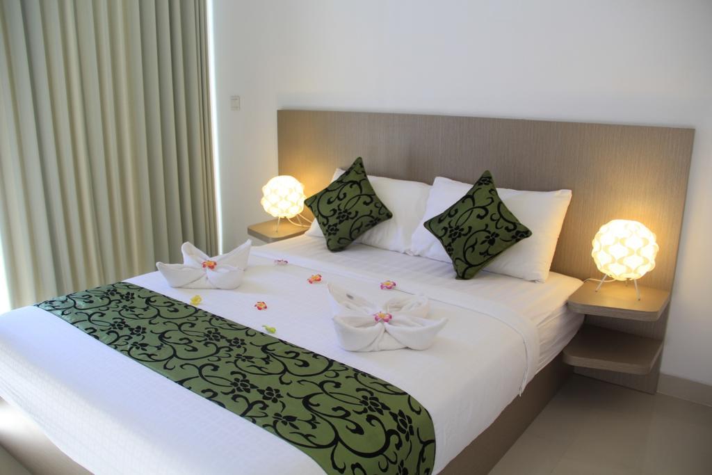 The Vinhill Studio Bali Apartment Pokoj fotografie